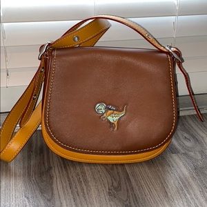 RARE Coach Embossed Space Rexy Saddle Bag